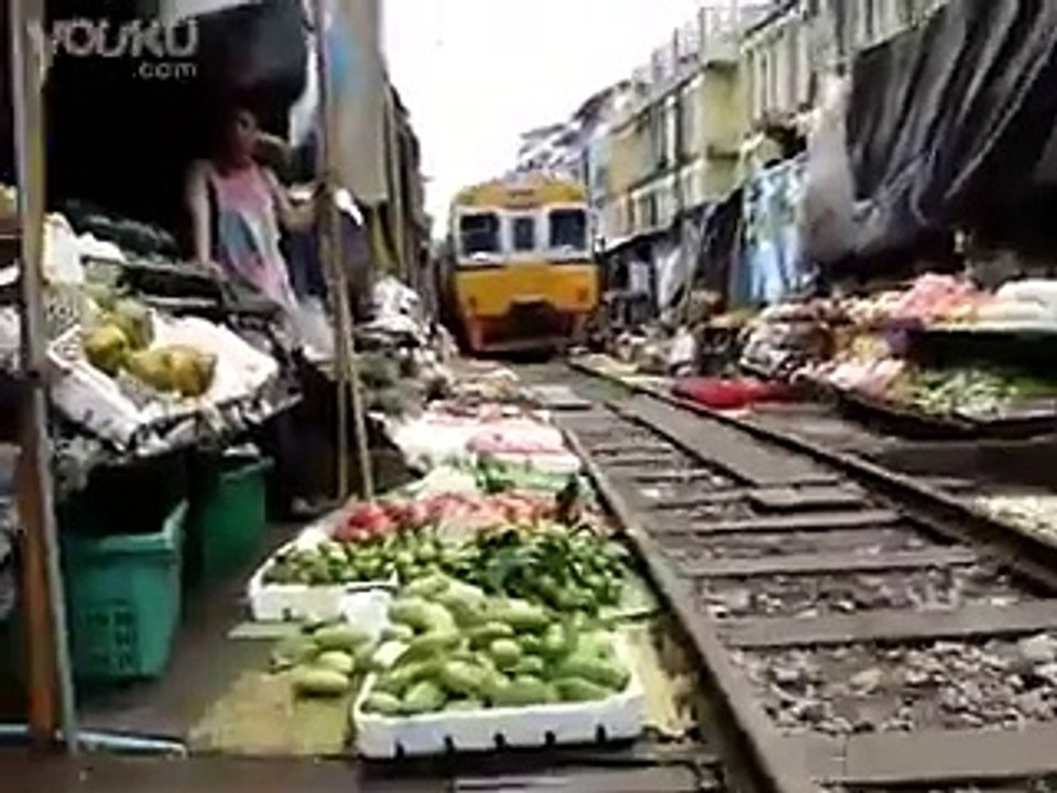 Unbelievable Train Passing Through a Market Amazing