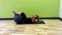 How To Do The Crunch - Legs On Exercise Ball - Fitness Training For Females - FxFitness.ca