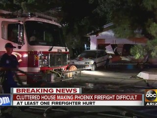 Firefighter hurt battling Phoenix house fire