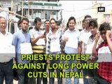 Priests protest against long power cuts in Nepal