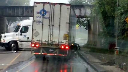 Driver Fails at Low Bridge U-Turn
