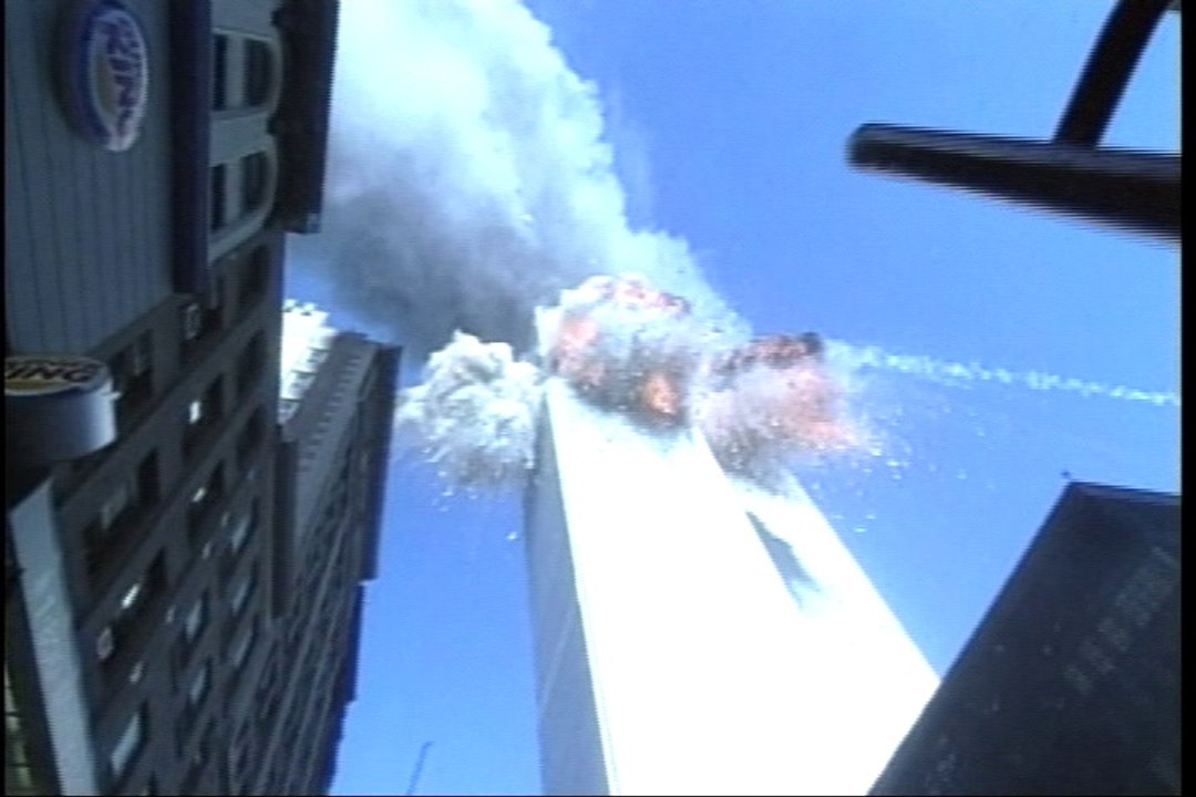 Plane hits building
