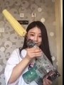 Asian Girl Eating Corn With Drill Fail
