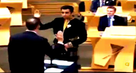 Muslim politician in a kilt Swears Oath in Urdu to British Queen