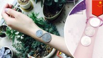Chinese netizens measuring their 'fitness' by hiding their wrist behind a coin