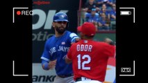 Rangers player punches Jose Bautista in the face during huge bench-clearing brawl