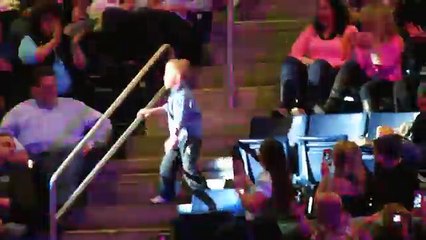Little boy dancing at the Rascal Flatts concert