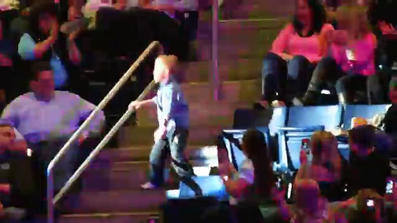 Little boy dancing at the Rascal Flatts concert