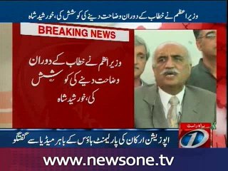 Opposition Leader Khurshid Shah talks to media outside Parliament