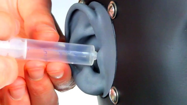 ASMR binaural dummy head - ear cleaning