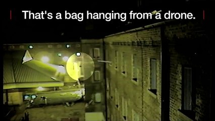 Drone delivers drugs & mobiles to London prisoners - BBC News