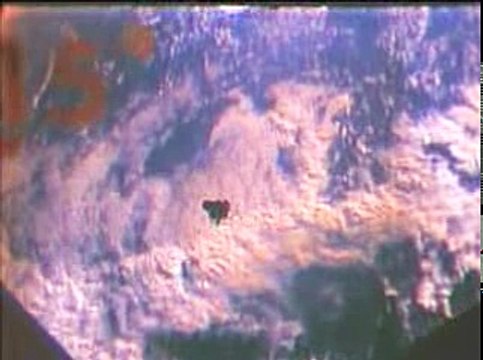 The Apollo 9 Command Module 'Gumdrop' approaches the Lunar Module 'Spider.'