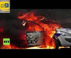 محتجون فرنسيون يضرمون النار في سيارة شرطة