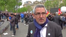 Clashes erupt between protesters and officers at Paris police demo