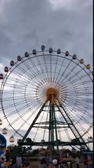 Strong wind blowing the ferris wheel