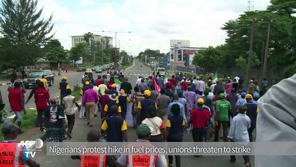 Nigerians demonstrate over petrol price rises