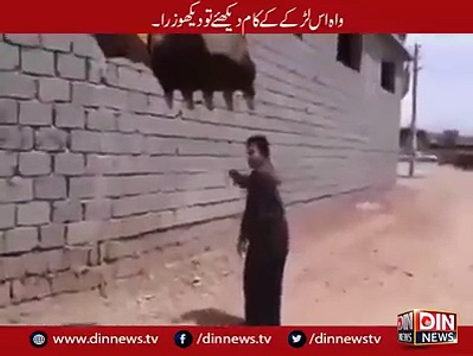 please watch what the boy is trying  to do