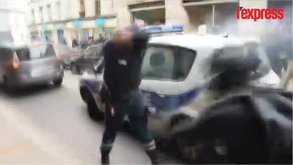 Voiture de police incendiée: l'agent agressé est le nouveau héros du net