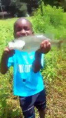 Boy Excited after Catching Bass