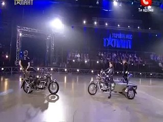 Amazing stunt and dancing on  running bike in public:
