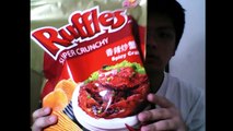 eating the big Ruffles super crunchy spicy crab potato chips