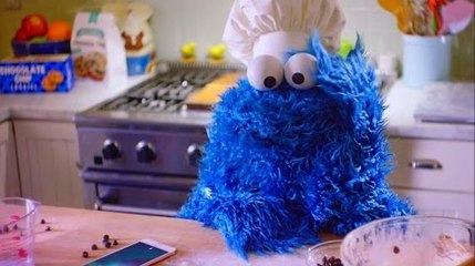 Cookie Monster loses his patience while baking cookies