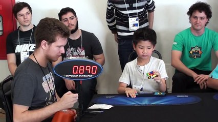 7 yrs old boy Solves Rubik's Cube with One Handed 27 sec