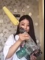 Asian Girl eating Corn with a drill fail part 1
