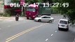 Motorcyclist in narrow escape as truck overturns