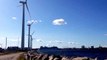 Biking in Refshalevej between Wind Turbines - Copenhagen - 27 August