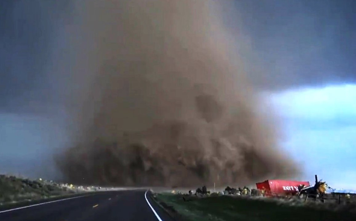 Guy Drives Right Up To a Huge Tornado!