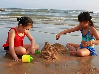 Kids Enjoying The Beach -  Slide Bouncer 2015