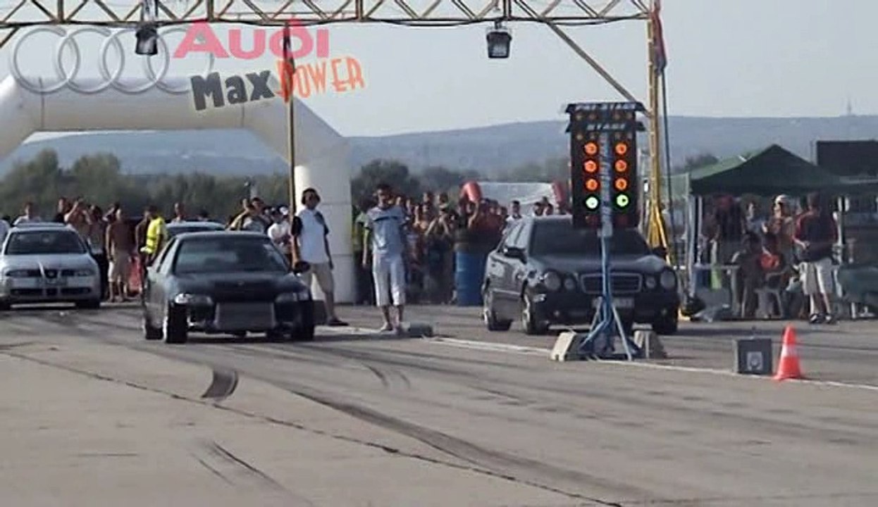 Mercedes E55 AMG Vs. Honda Civic Turbo