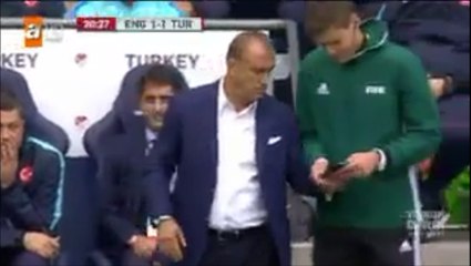Turkey's Coach Fatih Terim Shows The Referee Kane's Offside Goal On His Phone!