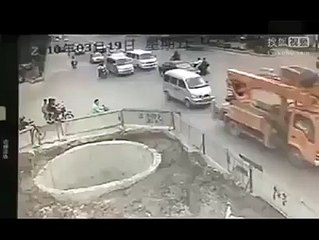 Bike Rider falls into Sinkhole