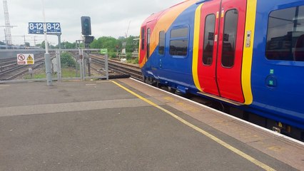 Class 458-5 departing Clapham Junction