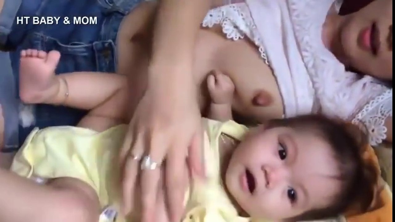 beautiful mother breastfeeding