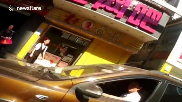 Driver drags police officer along a road