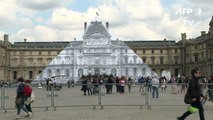 Pyramid at Louvre Museum covered by 