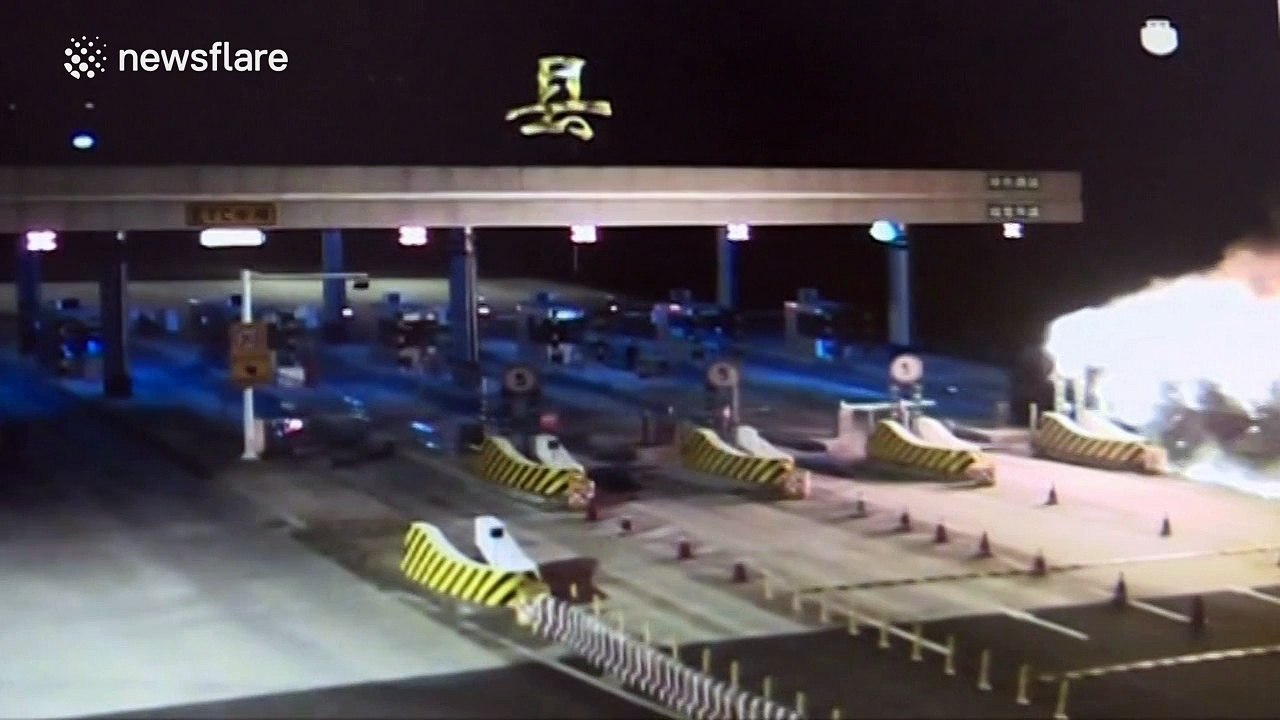 Lorry on fire drives through toll booth