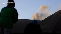 Etna volcano spews lava and ash