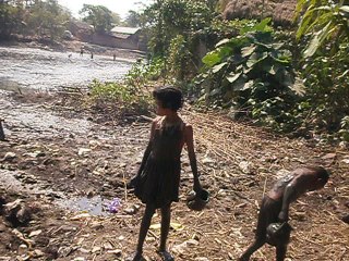 A MUDDIN POND AND CHTCHING FISH OF LITTLE HOLY BOY