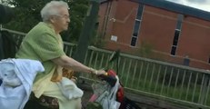 Woman Drives Mobility Scooter Through Rush Hour Traffic