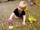 Roger at 10 months - Stacking Blocks