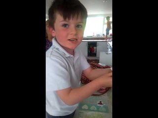 This Kid Is Really Happy He Finally Got a Wayne Rooney Sticker