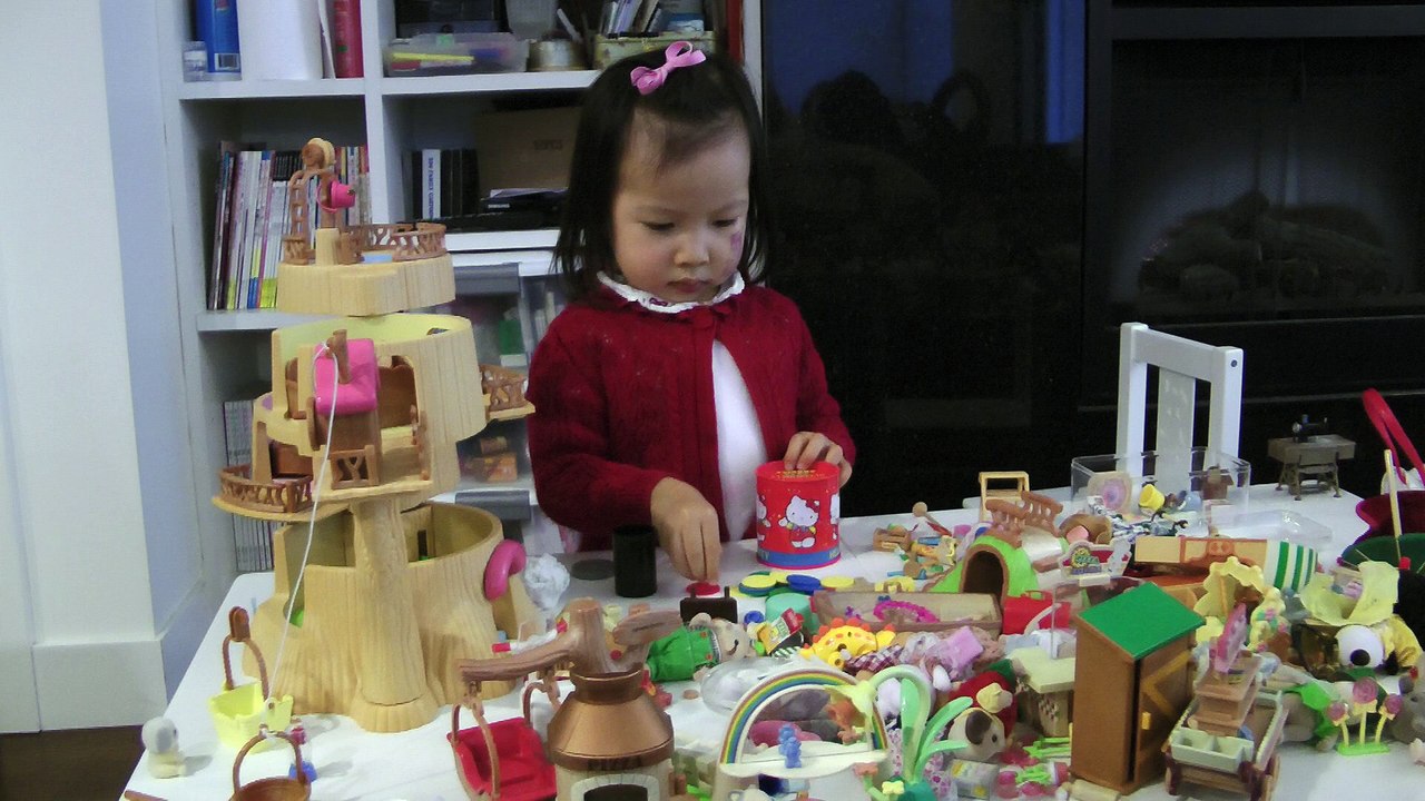 Girl Playing Coin Bank