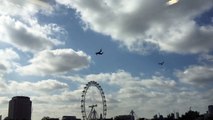 V-22 Ospreys military aircraft low flying over London Eye, Thames, Shard patrolling helicopters