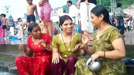 Religious bathing in the Ganges women and children enjoy their religiosity
