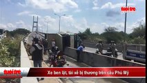 Xe ben lật, tài xế bị thương trên cầu Phú Mỹ