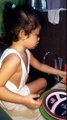 Baby zoe washing the dishes part 3